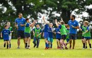 30 June 2015; Leinster Rugby's Ben Te'o and Isa Nacewa headed out to the Bank of Ireland Leinster Rugby Summer Camps in Wexford Wanderers RFC to meet up with some local young rugby talent. Pictured are Leinster's Ben Te'o and Isa Nacewa with kids from the Leinster Rugby Summer Camps 2015. Wexford Wanderers Rugby Club, Wexford. Picture credit: Matt Browne / SPORTSFILE