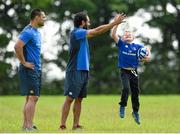 30 June 2015; Leinster Rugby's Ben Te'o and Isa Nacewa headed out to the Bank of Ireland Leinster Rugby Summer Camps in Wexford Wanderers RFC to meet up with some local young rugby talent. Pictured are Luke Sweeney from Clonard, Wexford Town, with Isa Nacewa and Ben Te'o during the Leinster Rugby Summer Camps 2015. Wexford Wanderers Rugby Club, Wexford. Picture credit: Matt Browne / SPORTSFILE