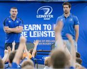 30 June 2015; Leinster Rugby's Kevin McLaughlin and Aaron Dundon headed out to the Bank of Ireland Leinster Rugby Summer Camps in Donnybrook Stadium to meet up with some local young rugby talent. Pictured are Leinster players Aaron Dundon, left, and Kevin McLaughlin, answer questions during the Bank of Ireland Leinster Rugby Summer Camps 2015. Donnybrook Stadium, Donnybrook, Dublin. Picture credit: Dáire Brennan / SPORTSFILE