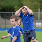 30 June 2015; Leinster Rugby's Kevin McLaughlin and Aaron Dundon headed out to the Bank of Ireland Leinster Rugby Summer Camps in Donnybrook Stadium to meet up with some local young rugby talent. Pictured is Aaron Dundon, Leinster, during a game of dodgeball at the Bank of Ireland the Leinster Rugby Summer Camps 2015. Donnybrook Stadium, Donnybrook, Dublin. Picture credit: Dáire Brennan / SPORTSFILE
