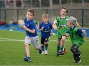 30 June 2015; Leinster Rugby's Kevin McLaughlin and Aaron Dundon headed out to the Bank of Ireland Leinster Rugby Summer Camps in Donnybrook Stadium to meet up with some local young rugby talent. Pictured is Sam Kinsella, aged 6, from Harold's Cross, Dublin, in action during the Bank of Ireland Leinster Rugby Summer Camps 2015. Donnybrook Stadium, Donnybrook, Dublin. Picture credit: Dáire Brennan / SPORTSFILE
