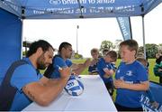 30 June 2015; Leinster Rugby's Ben Te'o and Isa Nacewa headed out to the Bank of Ireland Leinster Rugby Summer Camps in Wexford Wanderers RFC to meet up with some local young rugby talent. Pictured are Leinster's Isa Nacewa and James Mulholland signing autographs at the Leinster Rugby Summer Camps 2015. Wexford Wanderers Rugby Club, Wexford. Picture credit: Matt Browne / SPORTSFILE