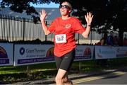 30 June 2015; Aisling Kelleher, Team Micro Trend, during the Corporate 5k Team Challenge. Cork. Picture credit: Cody Glenn / SPORTSFILE