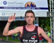 30 June 2015; Ryan Creech, from Glanmire, Co. Cork, representing The Edge team, after winning the Grant Thornton Corporate 5k Team Challenge. Cork. Picture credit: Cody Glenn / SPORTSFILE