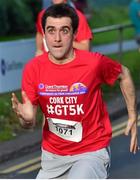 30 June 2015; Hussein Casey, of Limerick, representing Team Grant Thornton Limerick, sprints to the finish line in the Grant Thornton Corporate 5k Team Challenge. Cork. Picture credit: Cody Glenn / SPORTSFILE