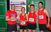 30 June 2015; John Kelly, left, former Munster rugby player and current Grant Thornton Director, presents the UCC Athletics Team, from right, Denis Coughlan, John Collins and Niamh Moore, with their cup for finishing first in the mixed team in the Grant Thornton Corporate 5k Team Challenge. Cork. Picture credit: Cody Glenn / SPORTSFILE