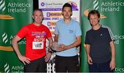 30 June 2015; John Kelly, left, former Munster rugby player and current Grant Thornton Director, presents members of the Gilead Team 1 with their cup for finishing third in the male team category in the Grant Thornton Corporate 5k Team Challenge. Cork. Picture credit: Cody Glenn / SPORTSFILE