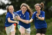 30 June 2015; Sarah Doyle, centre, in action against Hannah McLoughlin and Sabia Doyle, right, at the Leinster Rugby Summer Camps 2015. Wexford Wanderers Rugby Club, Wexford. Picture credit: Matt Browne / SPORTSFILE