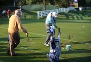 16 September 2008; Padraig Harrington, Team Europe 2008 on the driving range with his coach Bob Torrence during the first day of practice. 37th Ryder Cup, Valhalla Golf Club, Louisville, Kentucky, USA. Picture credit: Matt Browne / SPORTSFILE *** Local Caption ***