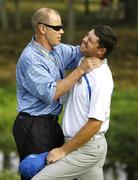 19 September 2008; Padraig Harrington, Team Europe 2008, receives treatment on his neck on the 5th green from his chiropractor Dale Rachardson during the morning foursomes. 37th Ryder Cup, Valhalla Golf Club, Louisville, Kentucky, USA. Picture credit: Matt Browne / SPORTSFILE