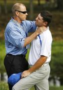 19 September 2008; Padraig Harrington, Team Europe 2008, receive treatment on his neck on the 5th green from his chiropractor Dale Rachardson during the morning foursomes. 37th Ryder Cup, Valhalla Golf Club, Louisville, Kentucky, USA. Picture credit: Matt Browne / SPORTSFILE