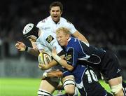 19 September 2008; Ryan Jones, Ospreys, is tackled by Leo Cullen and Isa Nacewa, 10, Leinster. Magners League, Leinster v Neath Swansea Ospreys, RDS, Dublin. Picture credit: Brendan Moran / SPORTSFILE