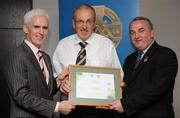 13 September 2008; Paudie Butler, Tipperary, receiving his Tutor Trainer Certificate from Michael McGeehan, left, Director Coaching Ireland and Nickey Brennan, President of the GAA. Tutor Trainer Graduation, Croke Park, Dublin. Photo by Sportsfile