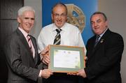 13 September 2008; Paudie Butler, Tipperary, receiving his Tutor Trainer Certificate from Michael McGeehan, left, Director Coaching Ireland and Nickey Brennan, President of the GAA. Tutor Trainer Graduation, Croke Park, Dublin. Picture credit: Paul Mohan / SPORTSFILE
