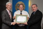 13 September 2008; Jimmy Darragh, Antrim, receiving his Tutor Trainer Certificate from Michael McGeehan, left, Director Coaching Ireland and Nickey Brennan, President of the GAA. Tutor Trainer Graduation, Croke Park, Dublin. Photo by Sportsfile