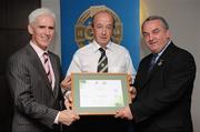 13 September 2008; Terence McWilliams, Derry, receiving his Tutor Trainer Certificate from Michael McGeehan, left, Director Coaching Ireland and Nickey Brennan, President of the GAA. Tutor Trainer Graduation, Croke Park, Dublin. Photo by Sportsfile