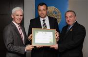 13 September 2008; Paul Earley, Kildare, receiving his Tutor Trainer Certificate from Michael McGeehan, left, Director Coaching Ireland and Nickey Brennan, President of the GAA. Tutor Trainer Graduation, Croke Park, Dublin. Photo by Sportsfile