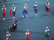 16 September 2008; A paralympic athlete takes photographs during the Closing Ceremony. Beijing Paralympic Games 2008, Closing Ceremony, National Stadium, Olympic Green, Beijing, China. Picture credit: Brian Lawless / SPORTSFILE
