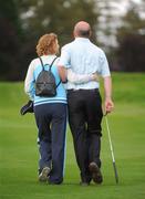 19 September 2008; Patrick McEntee, Co. Cavan Golf Club, is comforted by his wife Margaret after he, his team-mate Patrick Flynn and Co. Cavan Golf Club were beaten on the 20th hole by Neal O'Flynn and Michael Kellett, Clontarf Golf Club, in the Bulmers Jimmy Bruen Shield Semi-Final. Bulmers Cups and Shields Finals 2008, Monkstown Golf Club, Parkgarriff, Monkstown, Co. Cork. Picture credit: Ray McManus / SPORTSFILE