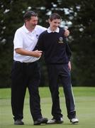 19 September 2008; Neal O'Flynn is congratulated by his dad Mick after Clontarf Golf Club defeated Co. Cavan Golf Club, on the 20th, in the semi-final of the Bulmers Jimmy Bruen Shield. Bulmers Cups and Shields Finals 2008, Monkstown Golf Club, Parkgarriff, Monkstown, Co. Cork. Picture credit: Ray McManus / SPORTSFILE