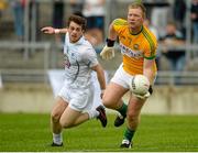 4 July 2015; Alan Mulhall, Offaly, in action against Niall Kelly, Kildare. GAA Football All-Ireland Senior Championship, Round 2A, Offaly v Kildare. O'Connor Park, Tullamore, Co. Offaly. Picture credit: Piaras Ó Mídheach / SPORTSFILE