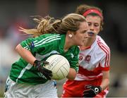 4 July 2015; Aoife Rowsome, Limerick, in action against Erin Kerrigan, Derry. All Ireland Ladies Football U14 'C' Championship, Derry v Limerick. Ballymahon, Co. Longford. Picture credit: David Maher / SPORTSFILE
