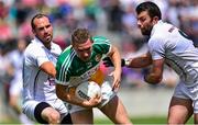 4 July 2015; Anton Sullivan, Offaly, in action against Kevin Murnaghan, left, and Padraig O'Neill, Kildare. GAA Football All-Ireland Senior Championship, Round 2A, Offaly v Kildare. O'Connor Park, Tullamore, Co. Offaly. Picture credit: Cody Glenn / SPORTSFILE