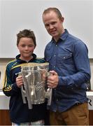 4 July 2015; Kilkenny great Tommy Walsh with Aaron Busher, from Wexford, and the Liam MacCarthy Cup at today’s Bord Gáis Energy Legends Tour at Croke Park, where he relived some of most memorable moments from his playing career. All Bord Gáis Energy Legends Tours include a trip to the GAA Museum, which is home to many exclusive exhibits, including the official GAA Hall of Fame. For booking and ticket information about the GAA legends for this summer’s tours visit www.crokepark.ie/gaa-museum. Croke Park, Dublin.  Picture credit: Brendan Moran / SPORTSFILE