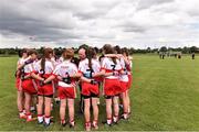 4 July 2015; The Derry team form a huddle with manager Ciaran Brown, before the start of the game. All Ireland Ladies Football U14 'C' Championship, Derry v Limerick. Ballymahon, Co. Longford. Picture credit: David Maher / SPORTSFILE