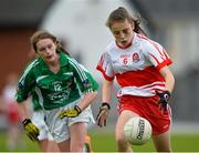 4 July 2015; Leah McGonagle, Derry, in action against Iris Kennelly, Limerick. All Ireland Ladies Football U14 'C' Championship, Derry v Limerick. Ballymahon, Co. Longford. Picture credit: David Maher / SPORTSFILE
