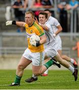4 July 2015; Alan Mulhall, Offaly, in action against Niall Kelly, Kildare. GAA Football All-Ireland Senior Championship, Round 2A, Offaly v Kildare. O'Connor Park, Tullamore, Co. Offaly. Picture credit: Piaras Ó Mídheach / SPORTSFILE