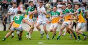 4 July 2015; Ciarán Fitzpatrick, Kildare, supported by team-mate Niall Kelly, left, takes on the Offaly defence. GAA Football All-Ireland Senior Championship, Round 2A, Offaly v Kildare. O'Connor Park, Tullamore, Co. Offaly. Picture credit: Piaras Ó Mídheach / SPORTSFILE