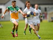 4 July 2015; Eoghan O'Flaherty, Kildare, in action against Joey O'Connor, Offaly. GAA Football All-Ireland Senior Championship, Round 2A, Offaly v Kildare. O'Connor Park, Tullamore, Co. Offaly. Picture credit: Piaras Ó Mídheach / SPORTSFILE