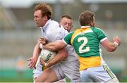 4 July 2015; Paul Cribbin, Kildare, in action against Brian Darby, 2, and Peter Cunningham, Offaly. GAA Football All-Ireland Senior Championship, Round 2A, Offaly v Kildare. O'Connor Park, Tullamore, Co. Offaly. Picture credit: Cody Glenn / SPORTSFILE