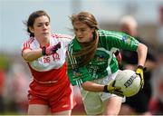 4 July 2015; Iris Kennelly, Limerick, in action against Anna Bonner, Derry. All Ireland Ladies Football U14 'C' Championship, Derry v Limerick. Ballymahon, Co. Longford. Picture credit: David Maher / SPORTSFILE