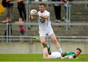 4 July 2015; Ciarán Fitzpatrick, Kildare, gets past Nigel Dunne, Offaly. GAA Football All-Ireland Senior Championship, Round 2A, Offaly v Kildare. O'Connor Park, Tullamore, Co. Offaly. Picture credit: Piaras Ó Mídheach / SPORTSFILE