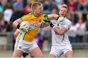 4 July 2015; Offaly goalkeeper Alan Mulhall tussles with Alan Smith, Kildare after Kildare's goal. GAA Football All-Ireland Senior Championship, Round 2A, Offaly v Kildare. O'Connor Park, Tullamore, Co. Offaly. Picture credit: Cody Glenn / SPORTSFILE