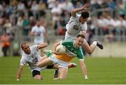 4 July 2015; Graham Guilfoyle, Offaly, in action against Kevin Murnaghan and Eoin Doyle, right, Kildare. GAA Football All-Ireland Senior Championship, Round 2A, Offaly v Kildare. O'Connor Park, Tullamore, Co. Offaly. Picture credit: Piaras Ó Mídheach / SPORTSFILE