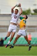 4 July 2015; Tommy Moolick, Kildare, in action against Eoin Carroll, Offaly. GAA Football All-Ireland Senior Championship, Round 2A, Offaly v Kildare. O'Connor Park, Tullamore, Co. Offaly. Picture credit: Cody Glenn / SPORTSFILE