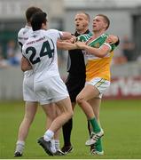 4 July 2015; Anton Sullivan, Offaly, tussles with Mikey Conway and Fionn Dowling, Kildare, during the second half. GAA Football All-Ireland Senior Championship, Round 2A, Offaly v Kildare. O'Connor Park, Tullamore, Co. Offaly. Picture credit: Piaras Ó Mídheach / SPORTSFILE