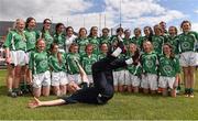 4 July 2015;  Limerick team celebrate with manager Barry O'Halloran at the end of the game. All Ireland Ladies Football U14 'C' Championship, Derry v Limerick. Ballymahon, Co. Longford. Picture credit: David Maher / SPORTSFILE