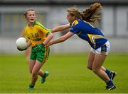 4 July 2015; Sarah Harkin, Donegal, in action against Marie Creedon, Tipperary. All Ireland Ladies Football U14 'B' Championship, Donegal v Tipperary. Ballymahon, Co. Longford. Picture credit: David Maher / SPORTSFILE