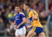 4 July 2015; Dean Ryan, Clare, celebrates after scoring his side's first goal. GAA Football All-Ireland Senior Championship, Round 2A, Clare v Longford. Cusack Park, Ennis, Co. Clare. Picture credit: Stephen McCarthy / SPORTSFILE