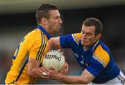 4 July 2015; Shane Hickey, Clare, in action against Fergal Battrim, Longford. GAA Football All-Ireland Senior Championship, Round 2A, Clare v Longford. Cusack Park, Ennis, Co. Clare. Picture credit: Stephen McCarthy / SPORTSFILE