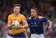 4 July 2015; Keelan Sexton, Clare, in action against Colman P. Smyth, Longford. GAA Football All-Ireland Senior Championship, Round 2A, Clare v Longford. Cusack Park, Ennis, Co. Clare. Picture credit: Stephen McCarthy / SPORTSFILE