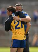 4 July 2015; Longford manager Jack Sheedy embraces Shane McGrath, Clare, ahead of the game. GAA Football All-Ireland Senior Championship, Round 2A, Clare v Longford. Cusack Park, Ennis, Co. Clare. Picture credit: Stephen McCarthy / SPORTSFILE