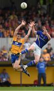 4 July 2015; Michael Quinn, Longford, in action against Jamie Malone, Clare. GAA Football All-Ireland Senior Championship, Round 2A, Clare v Longford. Cusack Park, Ennis, Co. Clare. Picture credit: Stephen McCarthy / SPORTSFILE