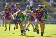 4 July 2015; Rebecca Delee, Limerick, in action against Shauna Sinnott, Wexford. Liberty Insurance Camogie Championship, Wexford v Limerick. Innovate Wexford Park, Wexford. Picture credit: Matt Browne / SPORTSFILE