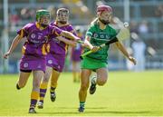 4 July 2015; Aoife Sheehan, Limerick, in action against Stacey Kehoe, Wexford. Liberty Insurance Camogie Championship, Wexford v Limerick. Innovate Wexford Park, Wexford. Picture credit: Matt Browne / SPORTSFILE