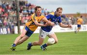 4 July 2015; Brian Kavanagh, Longford, in action against Kevin Harnett, Clare. GAA Football All-Ireland Senior Championship, Round 2A, Clare v Longford. Cusack Park, Ennis, Co. Clare. Picture credit: Stephen McCarthy / SPORTSFILE